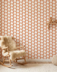 Terracotta Peaks geometric peach triangle wallpaper bringing warmth to a peaceful nursery