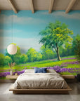 The Lilac Season lavender meadow and green tree landscape wallpaper in a warm and inviting living room