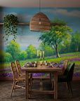 The Lilac Season lavender meadow and green tree landscape wallpaper adding character to a cozy bedroom