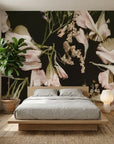 Blush pink tulips and dried florals on black The Still Hour removable wallpaper in modern bedroom