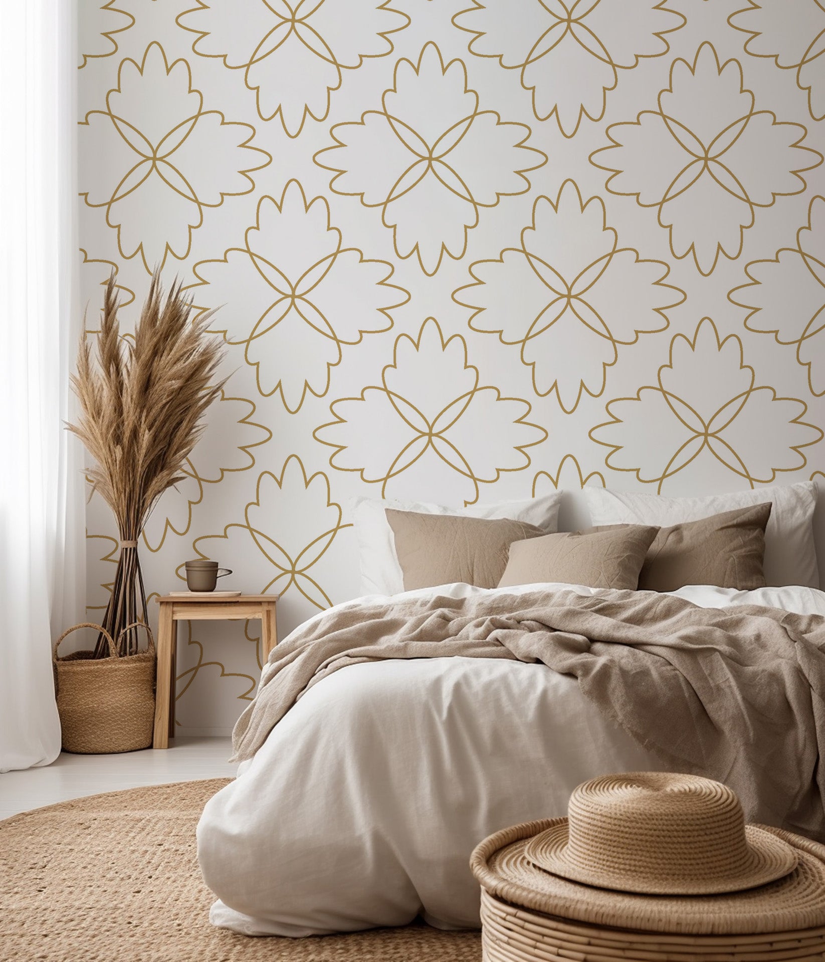 Floral quatrefoil design detailed with thin gold lines against a light backdrop