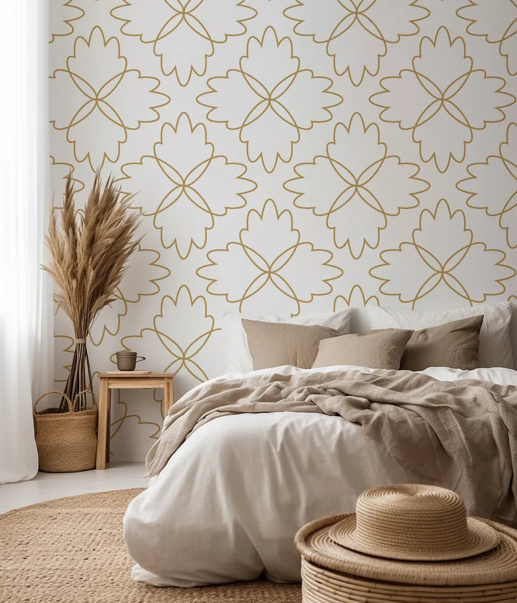 Floral quatrefoil design detailed with thin gold lines against a light backdrop