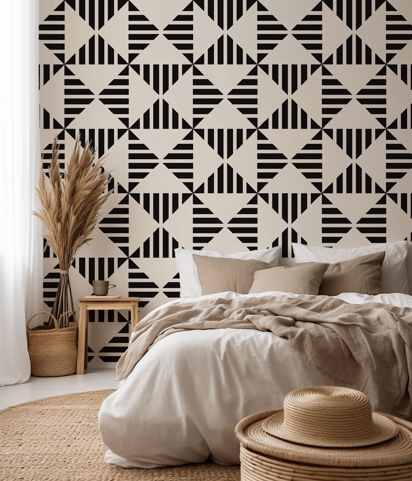 Ticking Wings peel and stick wallpaper featuring a black and white geometric triangle stripe pattern