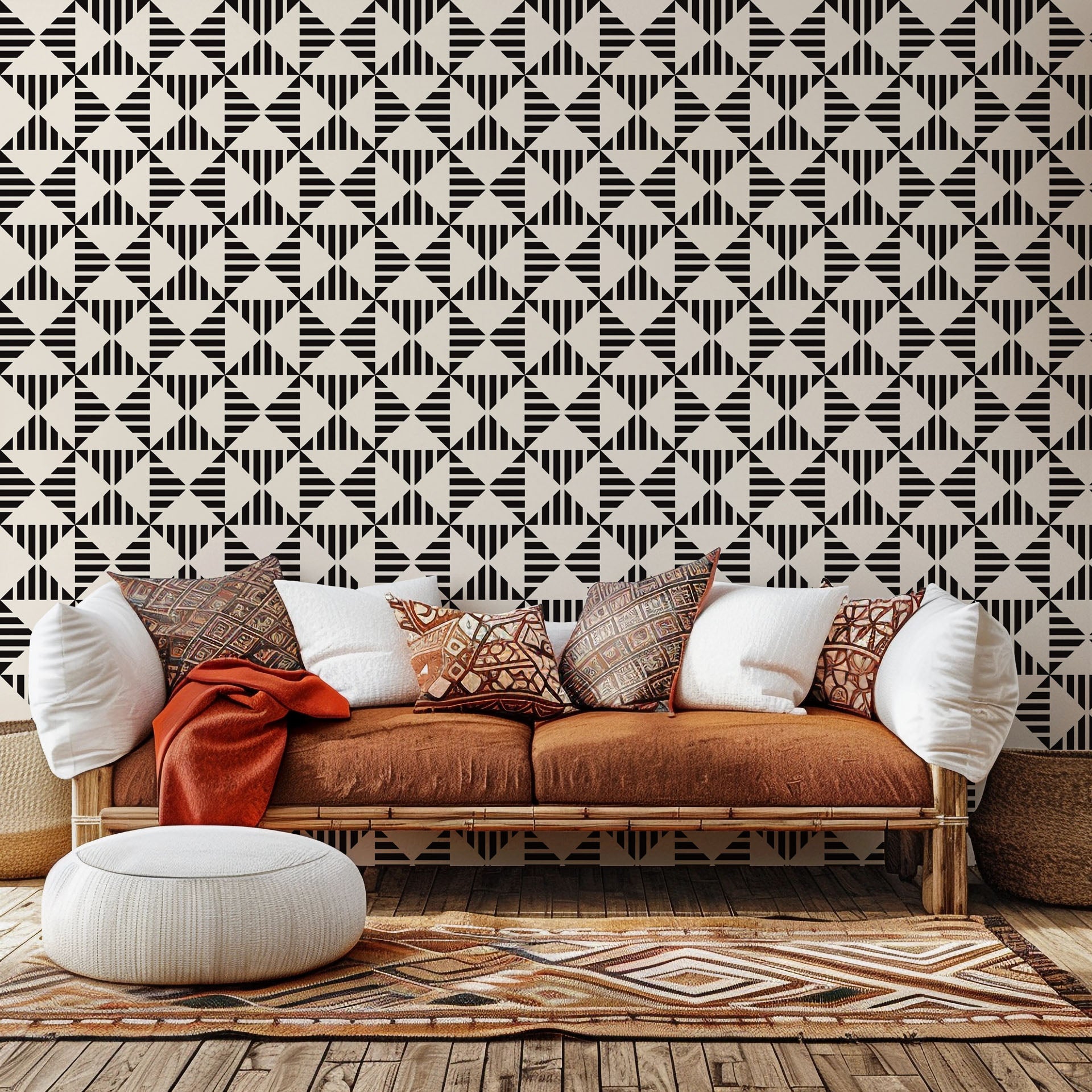 Self-adhesive wallpaper featuring a black and white geometric pattern of triangular stripes, product code Ticking Wings