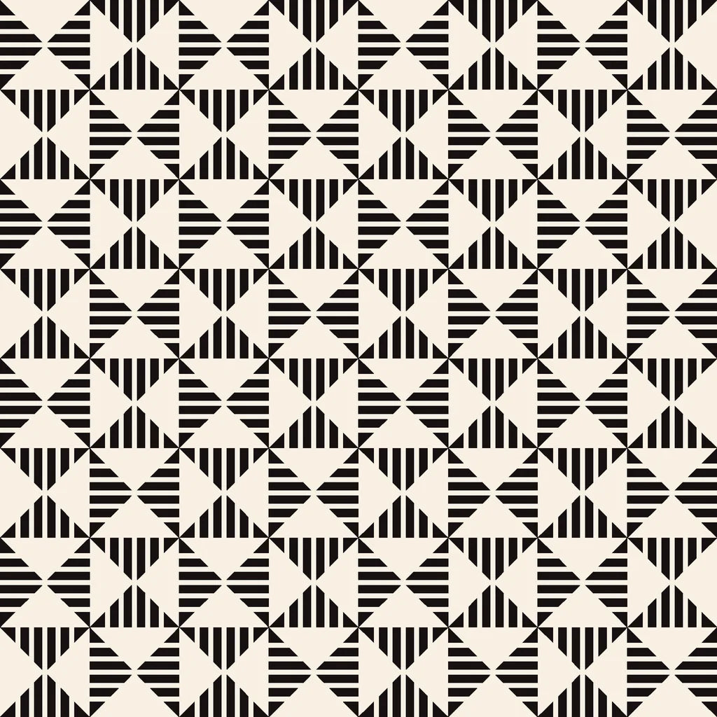 Self-adhesive wallpaper featuring Ticking Wings design, a monochrome pattern of geometric triangles and stripes
