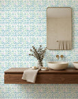 Tidal Scatter coastal blue abstract wallpaper creating ambiance in a serene bathroom