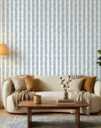Tide Garden blue botanical peel and stick wallpaper in a warm and inviting living room