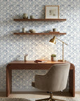 Tide's Armor blue geometric peel and stick wallpaper as a feature wall in a bright home office