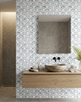 Tide's Armor blue geometric peel and stick wallpaper creating ambiance in a serene bathroom