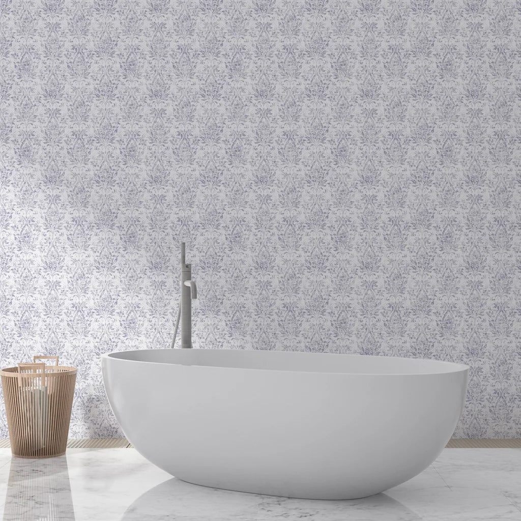 Tranquil Flora damask wallpaper in soft lavender and white behind modern freestanding bathtub