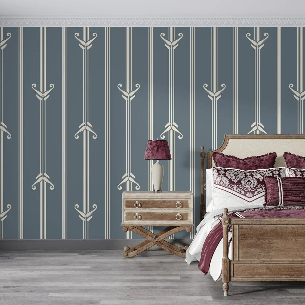 Slate blue and cream Art Deco stripe wallpaper with geometric arrow motifs in elegant bedroom setting