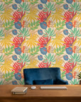 Colorful tropical leaf botanical peel and stick wallpaper - Tropics at High Noon adding character to a bedroom