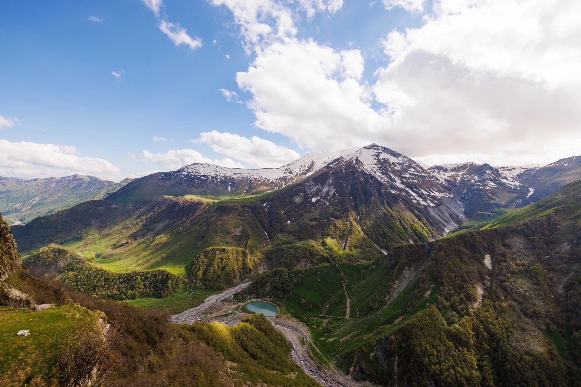 Pristine turquoise valley landscape removable wallpaper