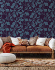 A deep violet wall covering adorned with a winding blue flower silhouette design, style name Twilight Bloom