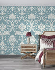 Teal and cream damask Twilight Garden Veil wallpaper in elegant bedroom with rustic wood furniture