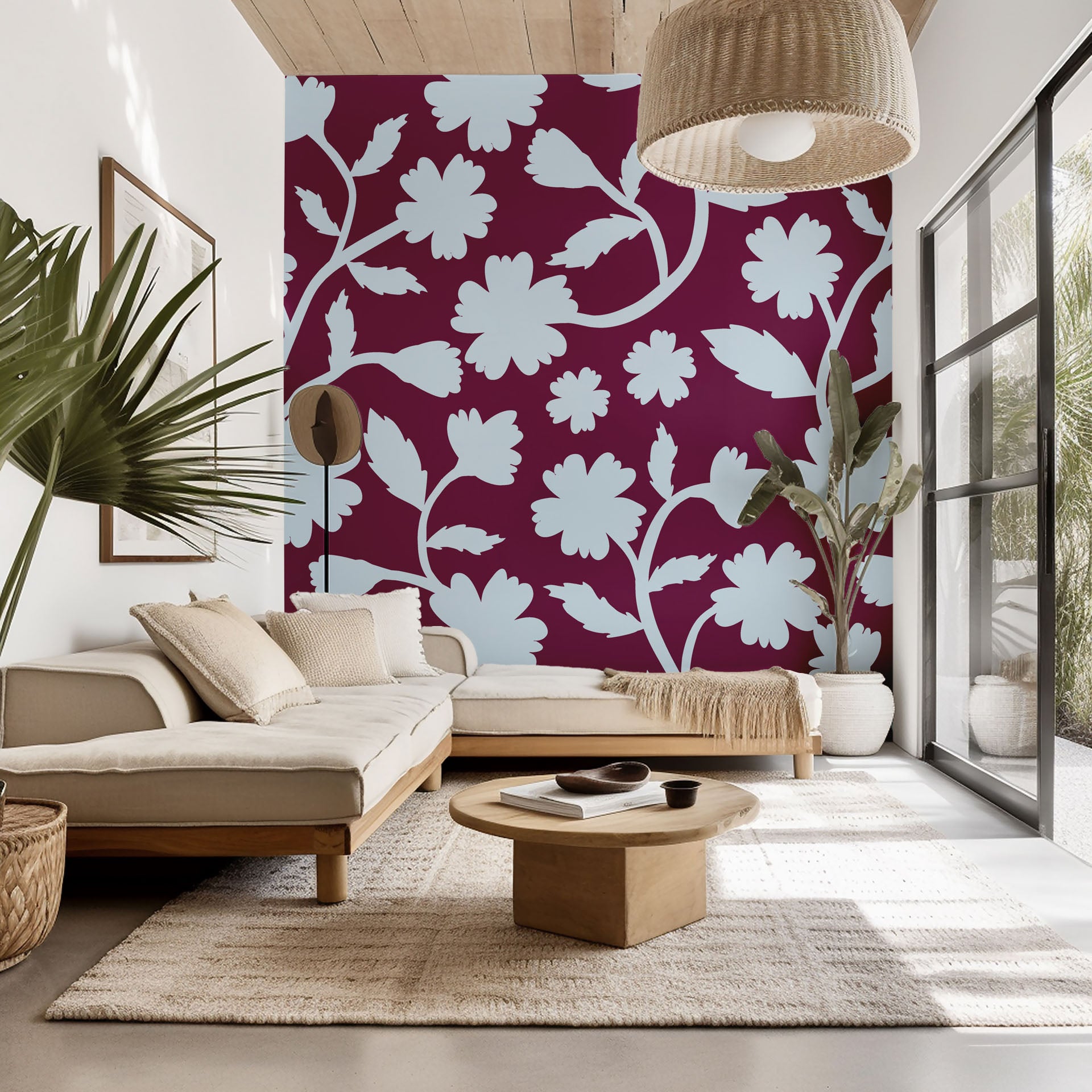 Velvet Bloom peel and stick wall covering, displaying a light blue floral silhouette on a striking burgundy background