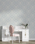 Blue and cream Velvet Vine Serenade damask wallpaper on vanity room accent wall with white furniture
