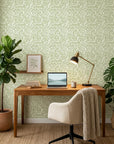 Smooth sage green leaf sprig botanical peel and stick wallpaper - Verdant Canopy as a feature wall in an office