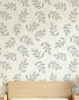 Textured scattered green leaf botanical sprig peel and stick wallpaper - Verdant Scatter in a warm living room