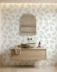 Textured scattered green leaf botanical sprig peel and stick wallpaper - Verdant Scatter as a feature wall in an office