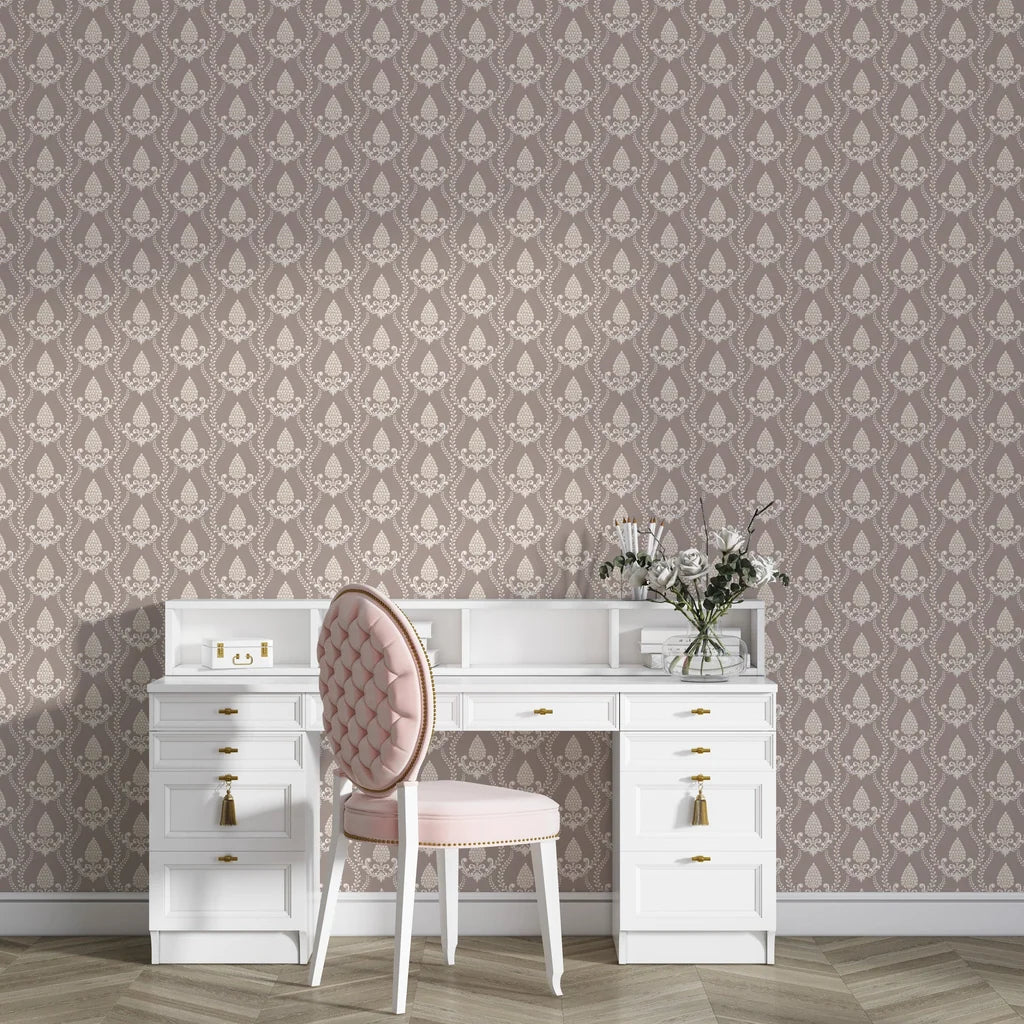 Taupe and cream Victorian Vineage damask wallpaper behind elegant white vanity desk with blush pink chair