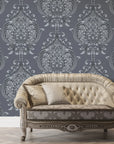 Vintage Eden removable wallpaper on living room wall with charcoal damask pattern and silver metallic accents