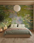 Impressionist Water Lily Garden mural wallpaper with green pond and pink florals in serene bedroom