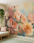 Watercolor floral wallpaper with peach and coral blooms on soft blue background in modern living room
