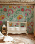 Playful rainbow scribble motifs on ivory self-adhesive wall covering, child-like wax pencil doodle design. - Whimsy Meadow
