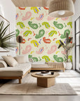Self-adhesive wallpaper (Whisper Bloom) showcasing a stylized abstract Ikat paisley pattern in colorful pastel tones