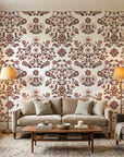 Whispered Garden vintage mauve floral damask wallpaper in a warm and inviting living room