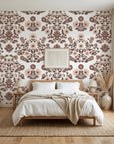 Whispered Garden vintage mauve floral damask wallpaper adding character to a cozy bedroom