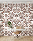 Whispered Garden vintage mauve floral damask wallpaper as a feature wall in a bright home office