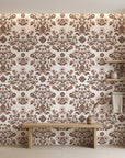 Whispered Garden vintage mauve floral damask wallpaper creating ambiance in a serene bathroom