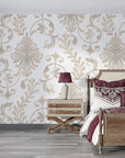 Taupe and cream Whispering Florals damask wallpaper in elegant bedroom with vintage furniture