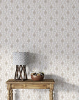 Taupe and cream Whispering Florals damask wallpaper in modern living room with wooden console table