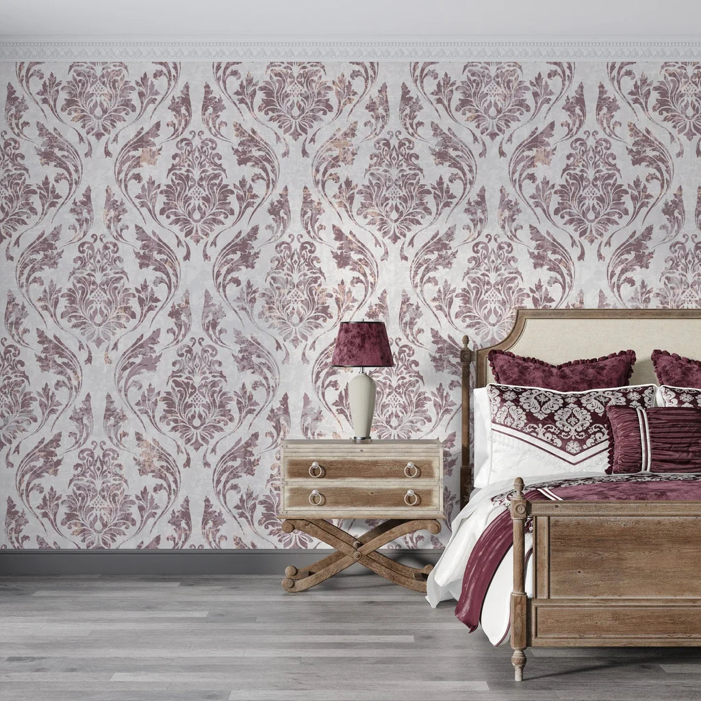 Burgundy and cream Wildwood Silk damask wallpaper on bedroom accent wall with vintage furniture
