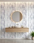 Winter Grove cool tone botanical peel and stick wallpaper creating ambiance in a serene bathroom