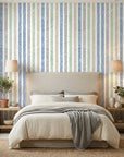 Smooth colorful wood grain ring stripe peel and stick wallpaper - Woodland Cross in a warm living room