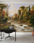 Woodland Haven mural wallpaper featuring autumn forest landscape with flowing stream in modern home office