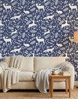 Woodland Hush serene navy woodland wallpaper in a warm and inviting living room