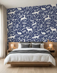 Woodland Hush serene navy woodland wallpaper adding character to a cozy bedroom