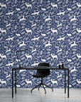 Woodland Hush serene navy woodland wallpaper as a feature wall in a bright home office