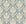 Elegant cream damask scrollwork on sage blue Woodland Blossom Veil peel and stick wallpaper