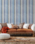 A zoomed-in look at the coastal wallpaper, revealing the detailed woven surface and soft, varying seaside colors