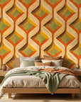 Woven Sway retro orange and green chevron wallpaper in a warm and inviting living room