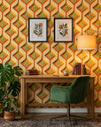Woven Sway retro orange and green chevron wallpaper adding character to a cozy bedroom