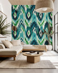 Self-adhesive wallpaper featuring an abstract blue and green Ikat wave design