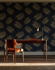 Acacia Scatter Black Gold dainty leaf wallpaper as a feature wall in a home study