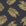Acacia Scatter Black Gold dainty leaf wallpaper in black and gold